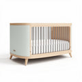 Wooden crib in white and natural wood finish with adjustable mattress height 120 x 60 x 80cm